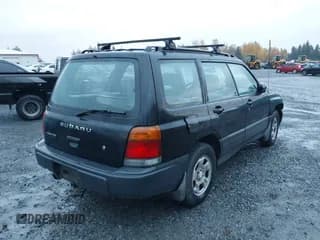 ✅ 2000 Subaru Forester L • VIN: JF1SF6350YH716661 • Lot: 43623272. Listed on IAAI with 132,244 mi. Free auction sales archive from the USA and detailed vehicle history report at DreamBid. Image 4.
