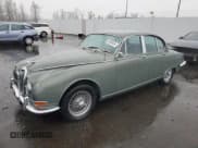 ✅ 1965 Jaguar S-Type • VIN: P1B76828BW • Lot: 85593434. Listed on Copart with 1,886 mi. Free auction sales archive from the USA and detailed vehicle history report at DreamBid. Image 1.