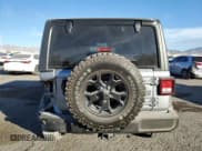 ✅ 2021 Jeep Wrangler Unlimited Willys • VIN: 1C4HJXDM6MW731668 • Lot: 86406244. Wystawiony na Copart z przebiegiem 73 414 mil. Bezpłatny archiwum sprzedaży aukcyjnych z USA i szczegółowy raport historii pojazdu na DreamBid. Zdjęcie 6.