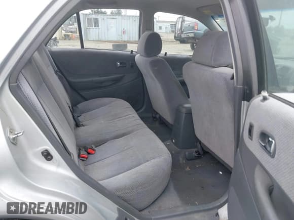 ✅ 2000 Mazda Protege DX • VIN: JM1BJ2225Y0211691 • Lot: 42464257. Listed on IAAI with 176,457 mi. Free auction sales archive from the USA and detailed vehicle history report at DreamBid. Image 8.