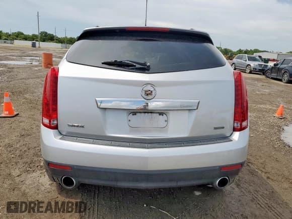 ✅ 2016 Cadillac SRX • VIN: 3GYFNAE31GS575354 • Lot: 64786435. Wystawiony na Copart z przebiegiem 176 079 mil. Bezpłatny archiwum sprzedaży aukcyjnych z USA i szczegółowy raport historii pojazdu na DreamBid. Zdjęcie 6.