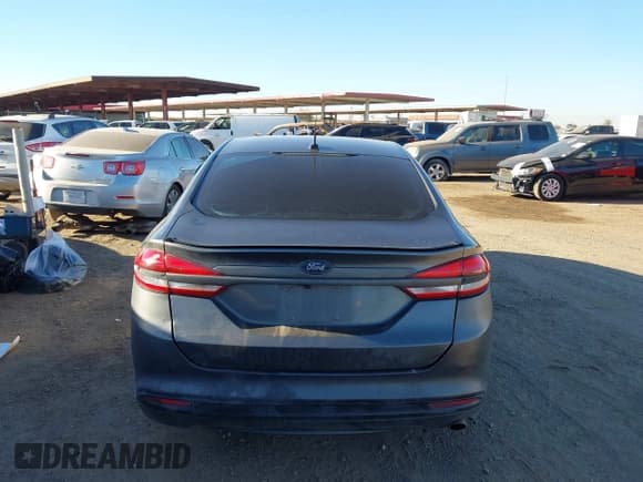 ✅ 2017 Ford Fusion Hybrid SE • VIN: 3FA6P0LU9HR384981 • Lot: 43904987. Listed on IAAI with 260,077 mi. Free auction sales archive from the USA and detailed vehicle history report at DreamBid. Image 16.