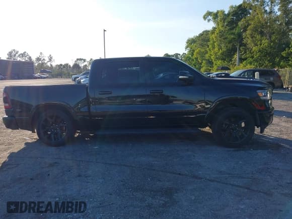 ✅ 2021 Ram 1500 Laramie • VIN: 1C6RREJT5MN544075 • Lot: 43603819. Listed on IAAI with 88,025 mi. Free auction sales archive from the USA and detailed vehicle history report at DreamBid. Image 13.