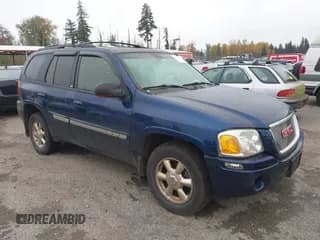 ✅ 2002 GMC Envoy SLT • VIN: 1GKDT13S522247392 • Lot: 43523641. Wystawiony na IAAI z przebiegiem 165 798 mil. Bezpłatny archiwum sprzedaży aukcyjnych z USA i szczegółowy raport historii pojazdu na DreamBid. Zdjęcie 1.