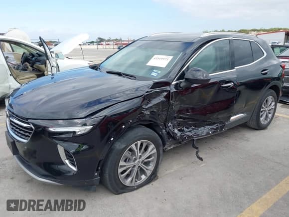 ✅ 2023 Buick Envision Preferred • VIN: LRBAZLR47PD032205 • Lot: 43549973. Listed on IAAI with 21,893 mi. Free auction sales archive from the USA and detailed vehicle history report at DreamBid. Image 2.