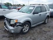 ✅ 2010 Ford Escape Hybrid • VIN: 1FMCU4K31AKB64889 • Лот: 43284558. Опубликован ранее на IAAI с пробегом 207 965 миль. Бесплатный доступ к архиву аукционных продаж из США и подробный отчёт об истории автомобиля на DreamBid. Изображение 2.