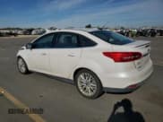 ✅ 2015 Ford Focus Titanium • VIN: 1FADP3J24FL274572 • Лот: 90742025. Опубликован ранее на Copart с пробегом 86 007 миль. Бесплатный доступ к архиву аукционных продаж из США и подробный отчёт об истории автомобиля на DreamBid. Изображение 2.
