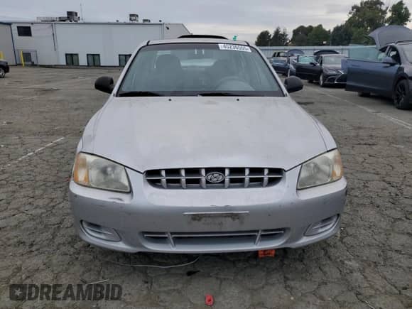 2002 Hyundai Accent GL with VIN KMHCG45C92U342413, listed as a Copart auction lot 45236555 with 120,207 mi miles and Salvage title. Bid and sale history available at DreamBid. Image 5.