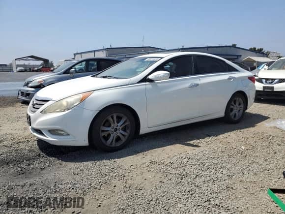 2011 Hyundai Sonata Limited с VIN 5NPEC4AC2BH059912, выставлен на аукционе Copart как лот 68974555 с пробегом 167 666 миль миль и Чистый • Clean title. История ставок и продаж доступна на DreamBid. Изображение 1.