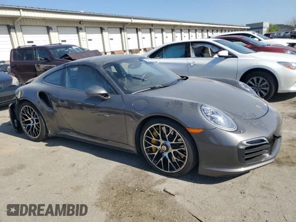 ✅ 2014 Porsche 911 Turbo • VIN: WP0AD2A92ES167652 • Lot: 75422514. Wystawiony na Copart z przebiegiem 35 360 mil. Bezpłatny archiwum sprzedaży aukcyjnych z USA i szczegółowy raport historii pojazdu na DreamBid. Zdjęcie 4.