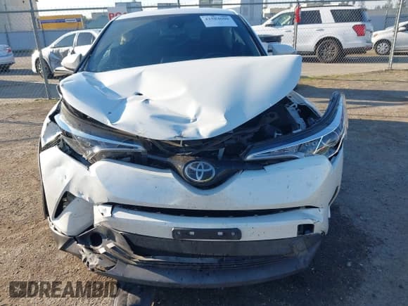 ✅ 2018 Toyota C-HR XLE • VIN: NMTKHMBX1JR052009 • Лот: 43584600. Опубликован ранее на IAAI с пробегом 88 065 миль. Бесплатный доступ к архиву аукционных продаж из США и подробный отчёт об истории автомобиля на DreamBid. Изображение 6.