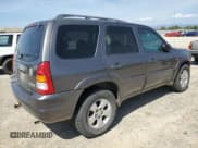 ✅ 2004 Mazda Tribute ES • VIN: 4F2CZ96174KM24843 • Lot: 58534335. Listed on Copart with 171,318 mi. Free auction sales archive from the USA and detailed vehicle history report at DreamBid. Image 3.