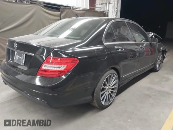 ✅ 2014 Mercedes-Benz C 250 Sport • VIN: WDDGF4HB9EA954859 • Lot: 42027885. Listed on IAAI with 64,223 mi. Free auction sales archive from the USA and detailed vehicle history report at DreamBid. Image 4.