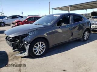 ✅ 2015 Mazda 3 i Touring • VIN: 3MZBM1V75FM203607 • Lot: 69461394. Listed on Copart with 115,518 mi. Free auction sales archive from the USA and detailed vehicle history report at DreamBid. Image 1.