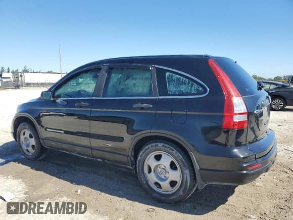 ✅ 2011 Honda CR-V LX • VIN: 5J6RE3H30BL001198 • Лот: 90689795. Опубликован ранее на Copart с пробегом 61 721 миль. Бесплатный доступ к архиву аукционных продаж из США и подробный отчёт об истории автомобиля на DreamBid. Изображение 2.