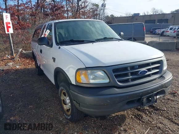 ✅ 2003 Ford F-150 XL • VIN: 2FTRX18W43CA62452 • Lot: 41497879. Listed on IAAI with 125,828 mi. Free auction sales archive from the USA and detailed vehicle history report at DreamBid. Image 1.