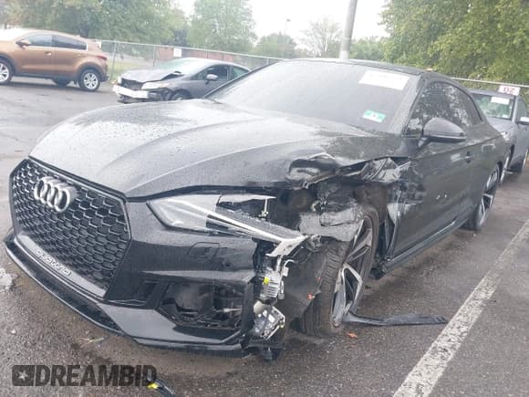 ✅ 2018 Audi RS 5 • VIN: WUAPWAF56JA903032 • Lot: 43246552. Listed on IAAI with 66,728 mi. Free auction sales archive from the USA and detailed vehicle history report at DreamBid. Image 2.