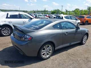 2007 Hyundai Tiburon GS с VIN KMHHM66D87U243753, выставлен на аукционе IAAI как лот 42796795 с пробегом 57 004 миль миль и . История ставок и продаж доступна на DreamBid. Изображение 4.
