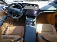 ✅ 2023 Lexus RZ 450e Premium • VIN: JTJAAAAB7PA010338 • Lot: 59992004. Listed on Copart with 10,040 mi. Free auction sales archive from the USA and detailed vehicle history report at DreamBid. Image 8.