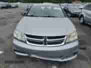 2013 Dodge Avenger SE с VIN 1C3CDZAB2DN712609, выставлен на аукционе Copart как лот 71402174 с пробегом 158 925 миль миль и Списание • Salvage title. История ставок и продаж доступна на DreamBid. Изображение 5.