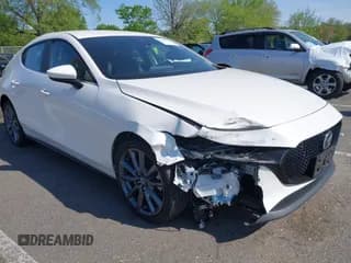 ✅ 2021 Mazda 3 Select • VIN: JM1BPBKL4M1313527 • Lot: 42167648. Listed on IAAI with 36,296 mi. Free auction sales archive from the USA and detailed vehicle history report at DreamBid. Image 1.