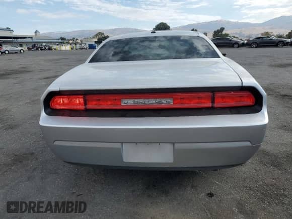 2009 Dodge Challenger SE with VIN 2B3LJ44V09H632935, listed as a Copart auction lot 72086674 with 64,028 mi miles and Salvage title. Bid and sale history available at DreamBid. Image 6.