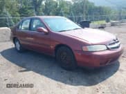 ✅ 2001 Nissan Altima GLE • VIN: 1N4DL01A21C124146 • Lot: 43014267. Listed on IAAI with 104,264 mi. Free auction sales archive from the USA and detailed vehicle history report at DreamBid. Image 1.