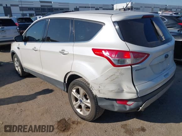 ✅ 2016 Ford Escape SE • VIN: 1FMCU0G79GUB71042 • Lot: 43315061. Listed on IAAI with 104,822 mi. Free auction sales archive from the USA and detailed vehicle history report at DreamBid. Image 3.