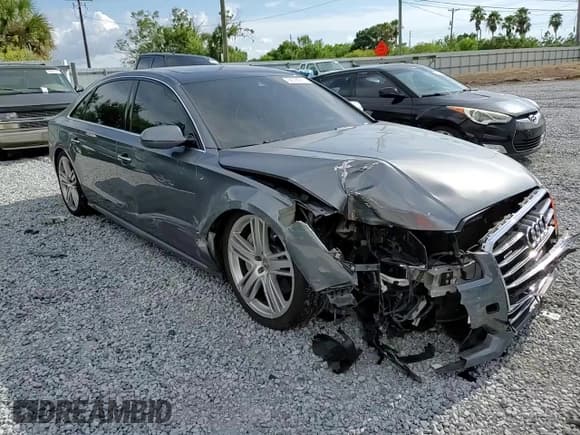 ✅ 2016 Audi A8 Sport • VIN: WAU43AFD8GN008513 • Lot: 68793975. Listed on Copart with 76,071 mi. Free auction sales archive from the USA and detailed vehicle history report at DreamBid. Image 13.