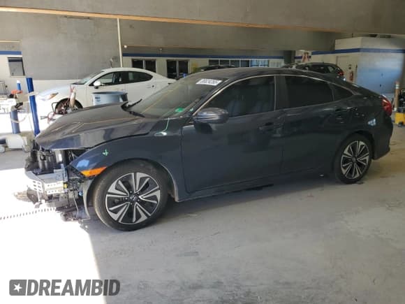 ✅ 2018 Honda Civic EX-T • VIN: 19XFC1E30JE000535 • Lot: 86624265. Listed on Copart with 130,182 mi. Free auction sales archive from the USA and detailed vehicle history report at DreamBid. Image 1.