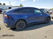 ✅ 2022 Tesla Model X • VIN: 7SAXCBE55NF364271 • Lot: 71999375. Wystawiony na Copart z przebiegiem 38 207 mil. Bezpłatny archiwum sprzedaży aukcyjnych z USA i szczegółowy raport historii pojazdu na DreamBid. Zdjęcie 3.