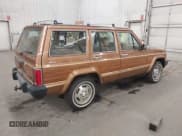 ✅ 1985 Jeep Grand Wagoneer • VIN: 1JCWC7567FT079177 • Lot: 43743736. Listed on IAAI with 132,950 mi. Free auction sales archive from the USA and detailed vehicle history report at DreamBid. Image 4.