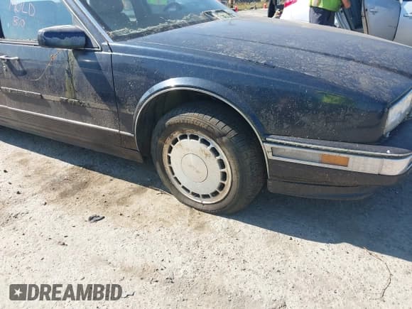 ✅ 1990 Cadillac Seville • VIN: 1G6KY5337LU818314 • Lot: 42807836. Listed on IAAI with 162,743 mi. Free auction sales archive from the USA and detailed vehicle history report at DreamBid. Image 6.