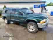 2002 Dodge Dakota SLT with VIN 1B7GG42N52S717818, listed as a Copart auction lot 61561785 with 133,580 mi miles and Non repairable. Bid and sale history available at DreamBid. Image 4.