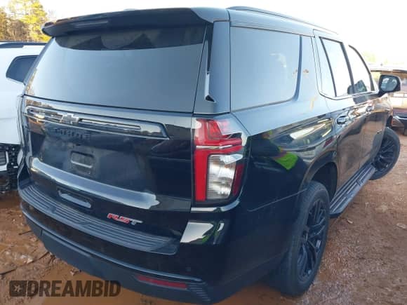 2023 Chevrolet Tahoe RST z VIN 1GNSKRKD7PR400349, wystawiony jako IAAI lot #41331940 z przebiegiem 25 503 mil mil oraz . Historia ofert i sprzedaży dostępna na DreamBid. Obrazek 4.