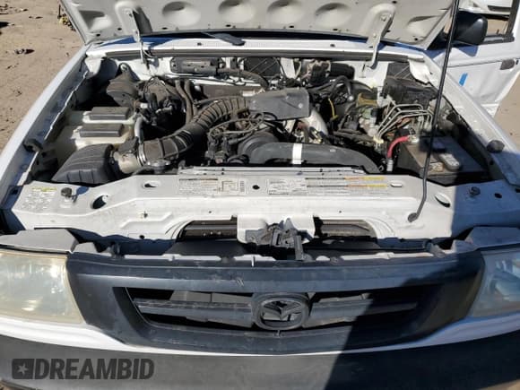 ✅ 2001 Mazda B-Series SX • VIN: 4F4YR12C21TM09582 • Lot: 84510354. Listed on Copart with 146,788 mi. Free auction sales archive from the USA and detailed vehicle history report at DreamBid. Image 12.