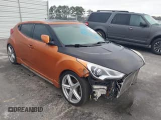 ✅ 2015 Hyundai Veloster Turbo • VIN: KMHTC6AE4FU222331 • Lot: 43880896. Listed on IAAI with 77,934 mi. Free auction sales archive from the USA and detailed vehicle history report at DreamBid. Image 1.
