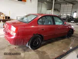 2004 Hyundai Elantra GLS z VIN KMHDN46D64U735399, wystawiony jako Copart lot #77533454 z przebiegiem Nie podano mil oraz Szkoda całkowita • Salvage title. Historia ofert i sprzedaży dostępna na DreamBid. Obrazek 3.