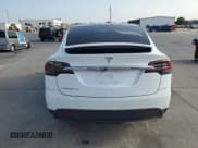✅ 2016 Tesla Model X 70D • VIN: 5YJXCBE28GF015658 • Lot: 65462064. Listed on Copart with 87,654 mi. Free auction sales archive from the USA and detailed vehicle history report at DreamBid. Image 6.