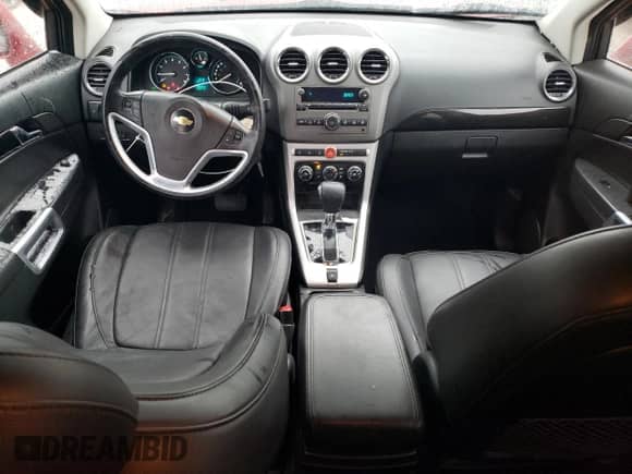 2013 Chevrolet Captiva Sport LT с VIN 3GNAL3EK0DS621087, выставлен на аукционе Copart как лот 84565244 с пробегом 82 337 миль миль и Списание • Salvage title. История ставок и продаж доступна на DreamBid. Изображение 8.