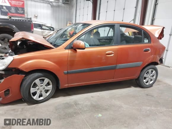✅ 2009 Kia Rio LX • VIN: KNADE223X96447092 • Lot: 43485187. Wystawiony na IAAI z przebiegiem 160 630 mil. Bezpłatny archiwum sprzedaży aukcyjnych z USA i szczegółowy raport historii pojazdu na DreamBid. Zdjęcie 15.