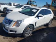 ✅ 2014 Cadillac SRX Performance Collection • VIN: 3GYFNCE37ES631757 • Lot: 43593230. Listed on IAAI with 104,628 mi. Free auction sales archive from the USA and detailed vehicle history report at DreamBid. Image 17.