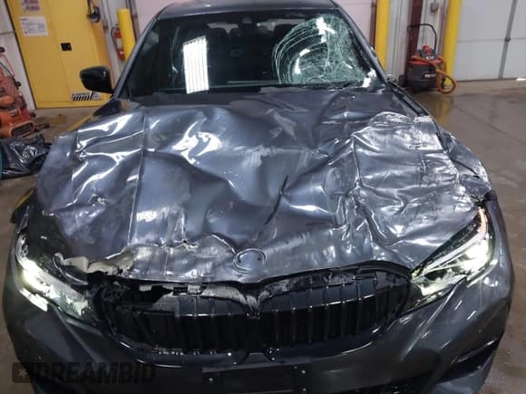 ✅ 2022 BMW 3 Series 330i xDrive • VIN: 3MW5R7J0XN8C70303 • Lot: 42121402. Wystawiony na IAAI z przebiegiem 29 187 mil. Bezpłatny archiwum sprzedaży aukcyjnych z USA i szczegółowy raport historii pojazdu na DreamBid. Zdjęcie 6.