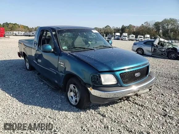 ✅ 2000 Ford F-150 XL • VIN: 1FTRX17W8YNA75949 • Lot: 92820815. Listed on Copart with 72,340 mi. Free auction sales archive from the USA and detailed vehicle history report at DreamBid. Image 14.