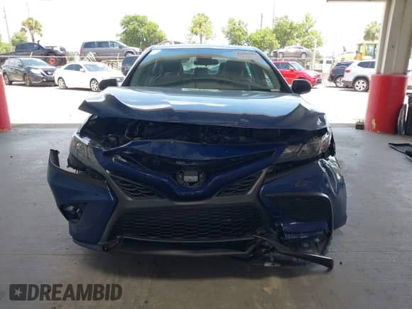 2023 Toyota Camry SE with VIN 4T1G11BK9PU091896, listed as a IAAI auction lot 42505987 with 75,683 mi miles and . Bid and sale history available at DreamBid. Image 12.