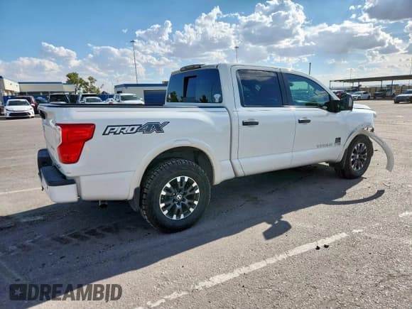 ✅ 2018 Nissan Titan Pro-4X • VIN: 1N6AA1E50JN518865 • Lot: 80469935. Wystawiony na Copart z przebiegiem 135 186 mil. Bezpłatny archiwum sprzedaży aukcyjnych z USA i szczegółowy raport historii pojazdu na DreamBid. Zdjęcie 3.