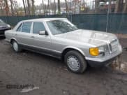 ✅ 1987 Mercedes-Benz 560 • VIN: WDBCA39D5HA357048 • Lot: 41672343. Listed on IAAI with 151,635 mi. Free auction sales archive from the USA and detailed vehicle history report at DreamBid. Image 1.