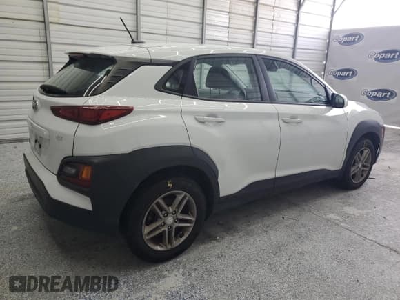 ✅ 2019 Hyundai Kona SE • VIN: KM8K12AA0KU246806 • Лот: 42668074. Опубликован ранее на Copart с пробегом 77 741 миль. Бесплатный доступ к архиву аукционных продаж из США и подробный отчёт об истории автомобиля на DreamBid. Изображение 3.