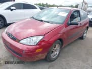 ✅ 2003 Ford Focus ZX3 • VIN: 3FAFP31Z23R187918 • Lot: 41969325. Listed on IAAI with Not provided. Free auction sales archive from the USA and detailed vehicle history report at DreamBid. Image 2.