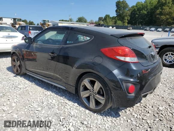 2015 Hyundai Veloster Turbo z VIN KMHTC6AE6FU232889, wystawiony jako Copart lot #71652674 z przebiegiem 122 709 mil mil oraz Szkoda całkowita • Salvage title. Historia ofert i sprzedaży dostępna na DreamBid. Obrazek 2.